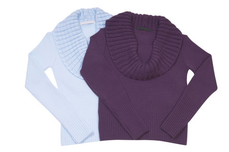 Two perfect feminine sweaters  isolated on a white background.