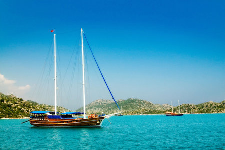 Bay in mediterranean sea with yachts in the Kekova. Turkey.の写真素材