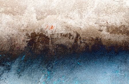 Old,grungy grey-blue wall can be used as backgroundの写真素材