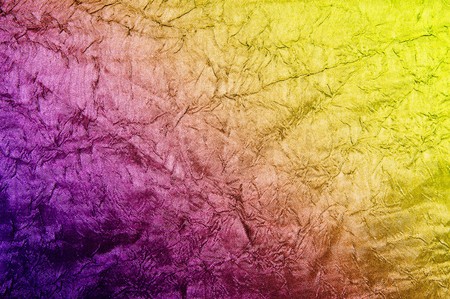 Yellow-purple  fabric can be used us background.の写真素材