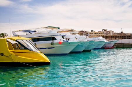 Expensive yachts in the turquoise harbor.の写真素材