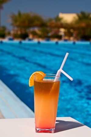 Tasty cocktail with lemon at the african resort, swimming pool.の写真素材