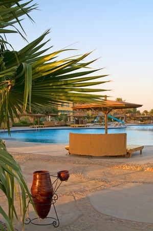 A hotel pool early morning in egyptian resort.の写真素材