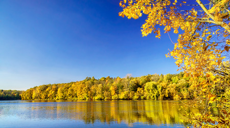 Wonderful view of autumnal lake.の写真素材