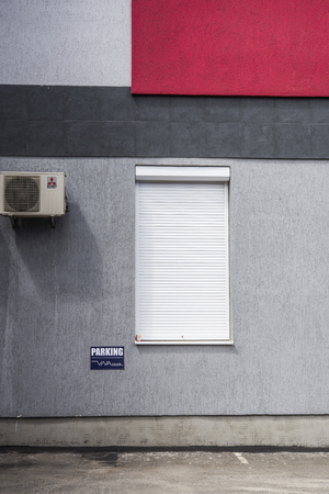 Building facade with air conditioningの写真素材