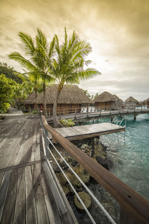 Luxury resort. Cute bungalow on the water in Bora Boraの写真素材