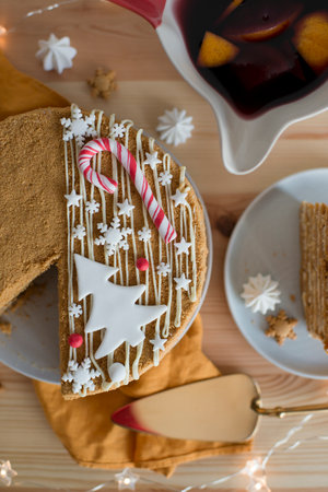 Christmas pastries in a cup on a wooden tableの写真素材