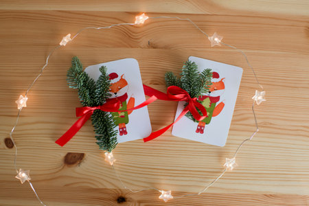 Cute postcards decorated with coniferous branches of nobilisの写真素材