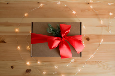 Craft box decorated with a red bowの写真素材