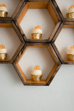 Cupcake decorated with honeycombsの写真素材