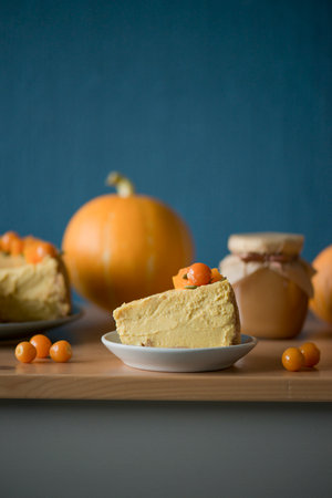 Pumpkin pastry cheesecake on the tableの写真素材