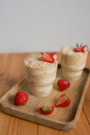 Pastries decorated with strawberriesの写真素材
