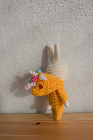A child's toy is on the table in the room, with its back.の写真素材