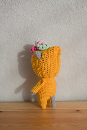 A child's toy is on the table in the room, with its back.の写真素材
