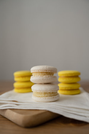 Yellow macarons on a white napkin, selective focus.の写真素材