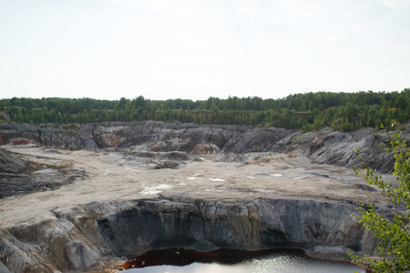 Landscape of a mining quarry in summer on a sunny day