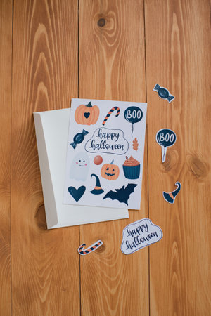 Halloween greeting card on wooden background. top view. flat lay.の写真素材