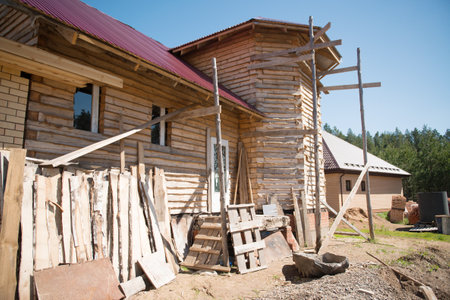 Wooden houses in the village. Construction of a wooden house.の写真素材