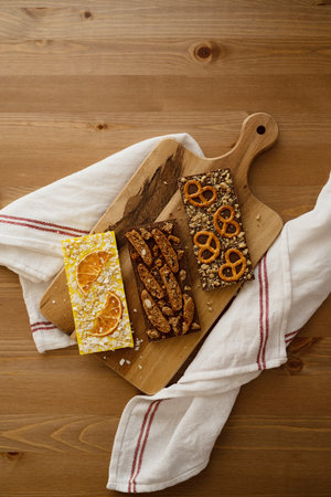 Chocolate bar on a wooden boardの写真素材