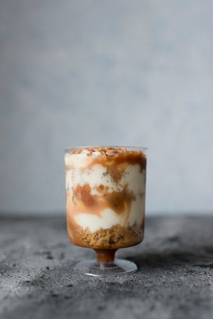 Dessert in a glass on a gray concrete backgroundの写真素材