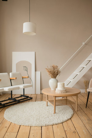 Interior of modern living room with white sofa and chair