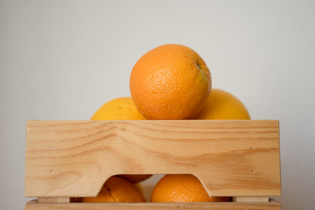 Fruit oranges are in a wooden boxの写真素材