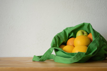 Fresh fruit oranges are in the reusable bag. Eco-friendly product. concern for the environment. food delivery.の写真素材