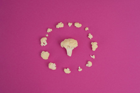 Cauliflower on a pink background. The concept of healthy eating.の写真素材