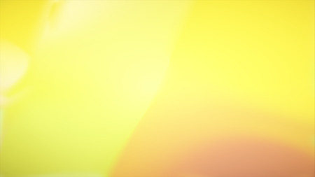 The image is blurry. Texture, background, pattern. Yellow silk fabric.の写真素材