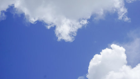 Clouds in the blue sky background.Sky clouds.Sky with clouds weather nature cloud blue. Blue sky with clouds and sun.の写真素材