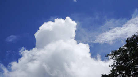 Clouds in the blue sky background.Sky clouds.Sky with clouds weather nature cloud blue. Blue sky with clouds and sun.の写真素材
