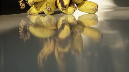 Bunch of ripe bananas on a white background. Close-up.の写真素材