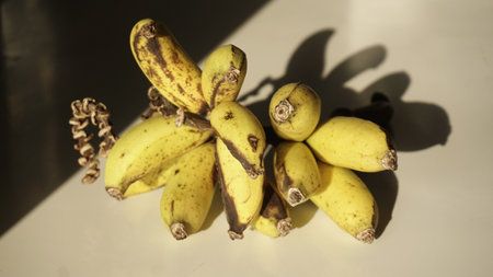 Bunch of ripe bananas on a white background. Close-up.の写真素材
