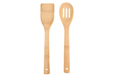 New wooden cutlery with kitchen spoon and spatula isolated on white background top viewの写真素材