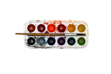 dirty watercolor paints and brushes for painting on a white background art the artist learnsの写真素材