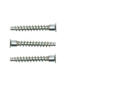 iron bolts, three screws isolated on whiteの写真素材