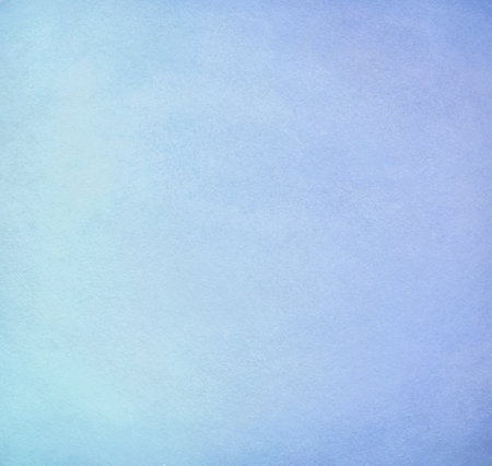 Watercolor bright blue painting with tone gradient and paper textureの写真素材