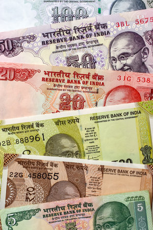 Close-up of 5, 10, 20, 50 and 100 rupees notes. Indian cash money