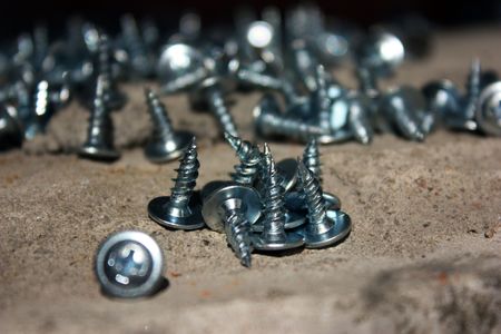 fasteners, screws for work, a lot of screws, screws, metal screws, screws shiny, new hardwareの写真素材