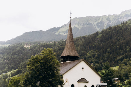 Scenic autumn view of picturesque alpine Wengen village and Lauterbrunnen Valley with Jungfrau Mountain and on background. Location: Wengen village, Berner Oberland, Switzerland, Europe.の写真素材
