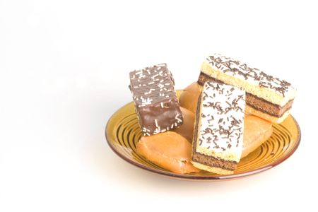 chocolate and cream cakes on the plate

の写真素材