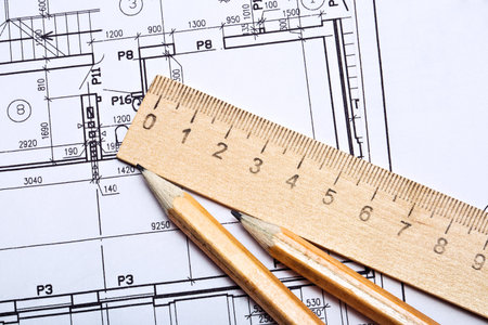 Workplace of architect. Architectural design, sketch, drawing paper, a pencil, wooden ruler on a...
