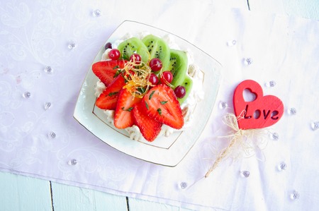 Meringue Nests filled with a Sweet Chestnut Cream and Strawberriesの写真素材