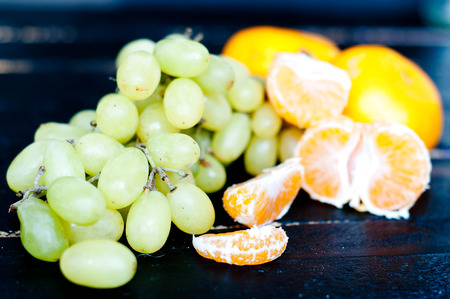 grapes and mandarin, still life, vitamins, fruitsの写真素材