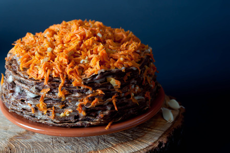 Pancake Pie from the Liver with Walnuts  on Wooden Tableの写真素材