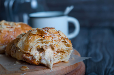 Fresh baked croissants, croissants with soft almond fillingの写真素材
