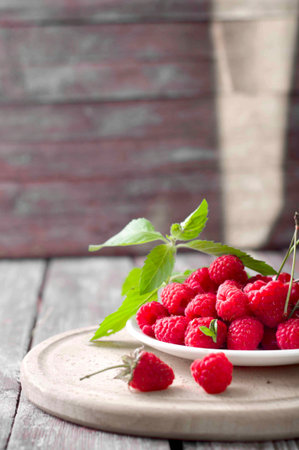 Ripe fresh aspberries isolated on a  background.