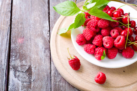 Ripe fresh aspberries isolated on a  background.