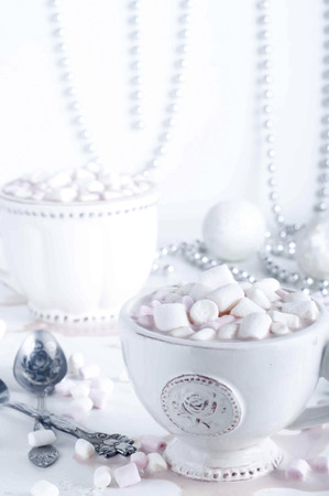 White cup of hot cocoa with marshmallowsの写真素材