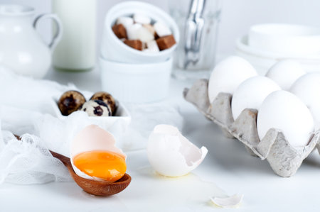 eggs flour milk butter and kitchen utensils